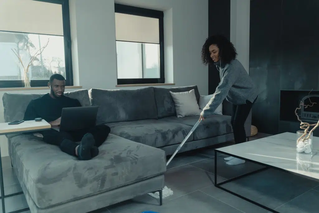 A woman mopping the floor
