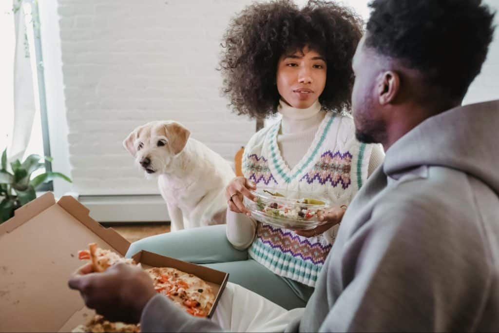 A man and woman looking at each other