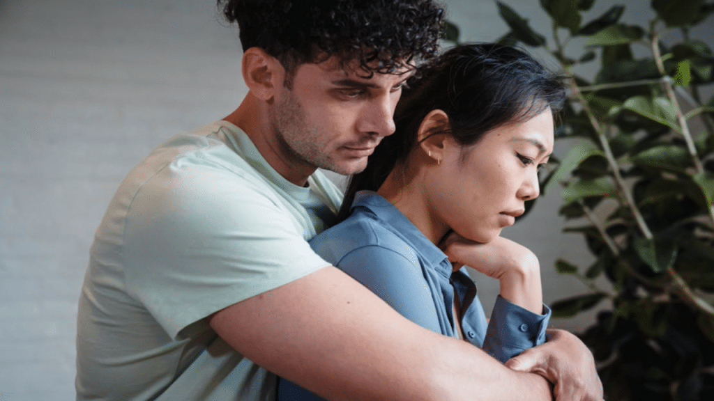 A man trying to apologize to his wife