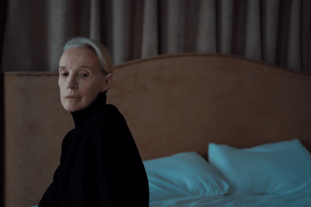 Photo of an Elderly Woman in a Black Turtleneck