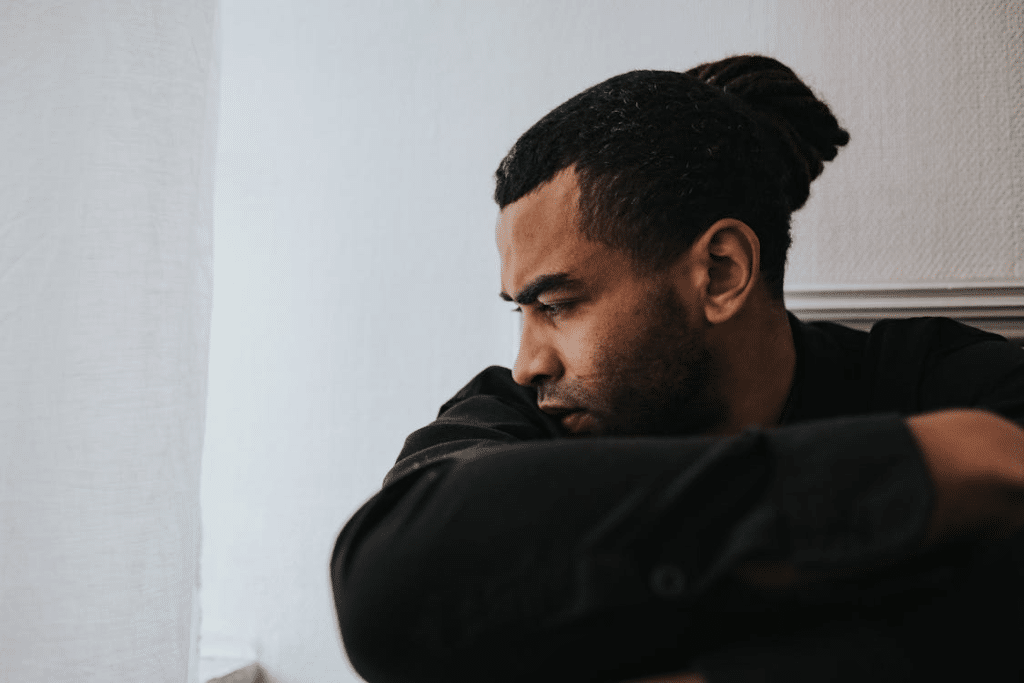 Man Sitting and Looking Sad