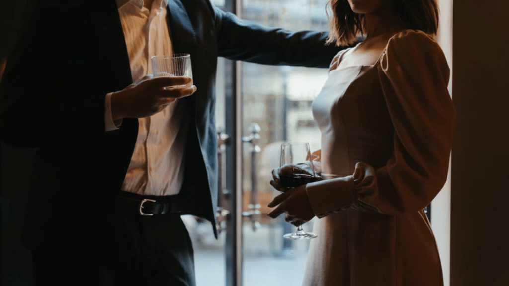 A couple talking at a party