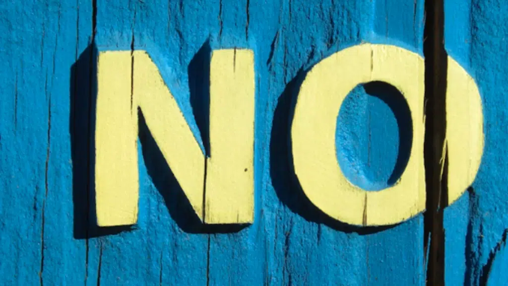 The word “no” painted on a wall
