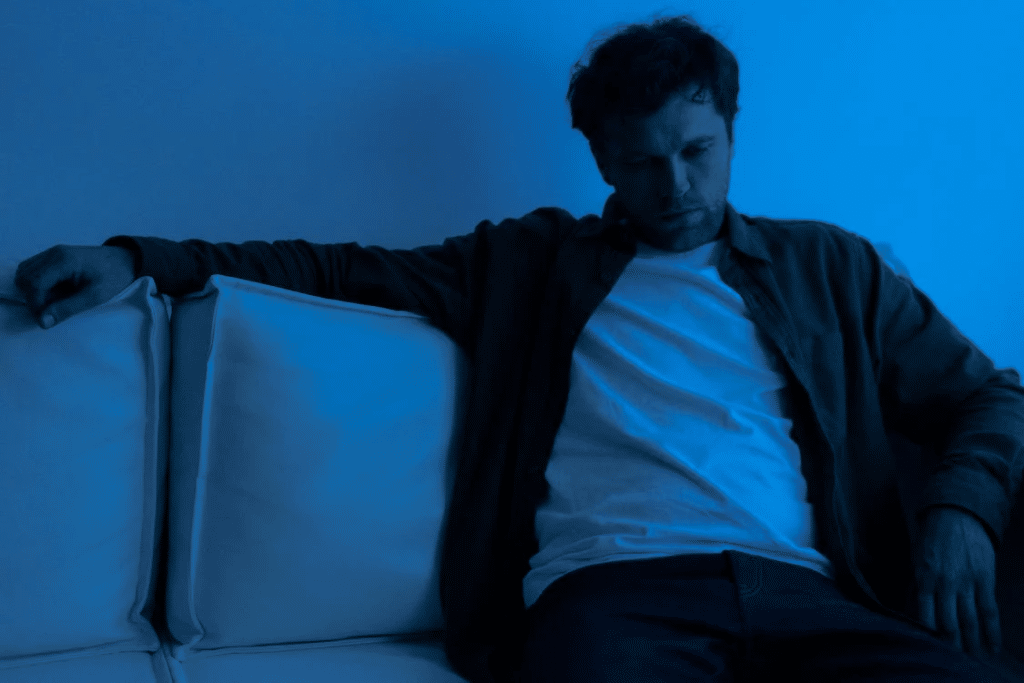 A Man Sitting on a Couch