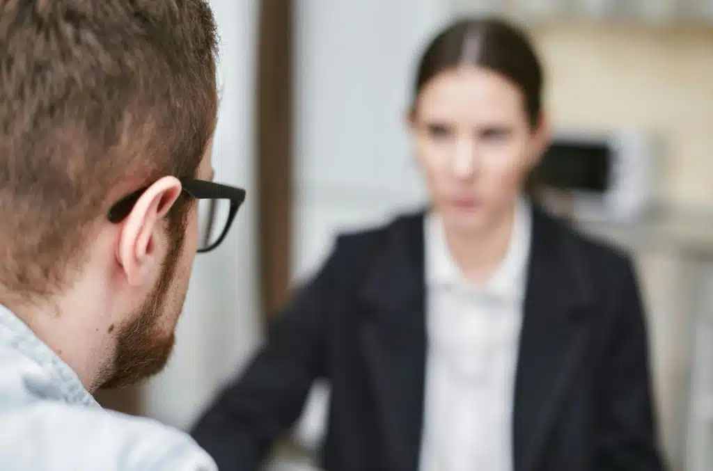 A man and woman looking at each other