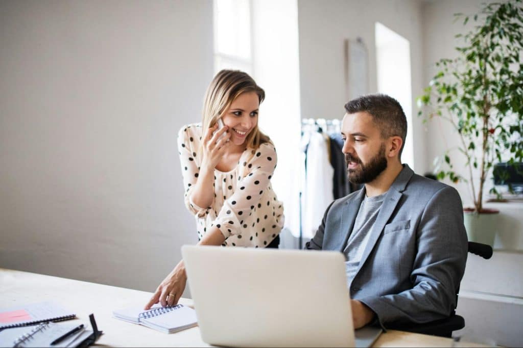 A man and woman working together