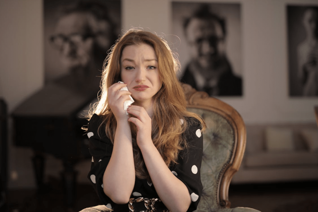 A Sad Woman in Black and White Polka Dots