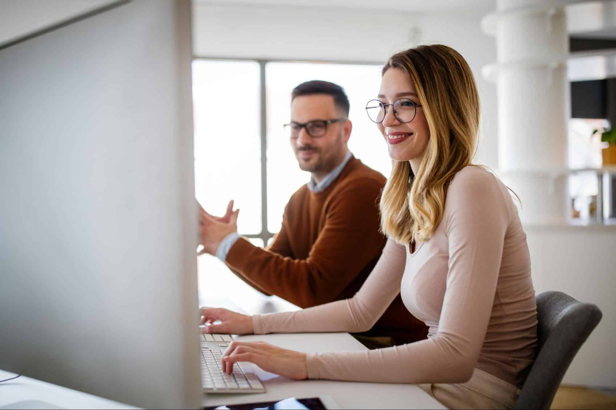 A man clapping for a woman