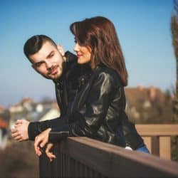 A man and woman at the balcony