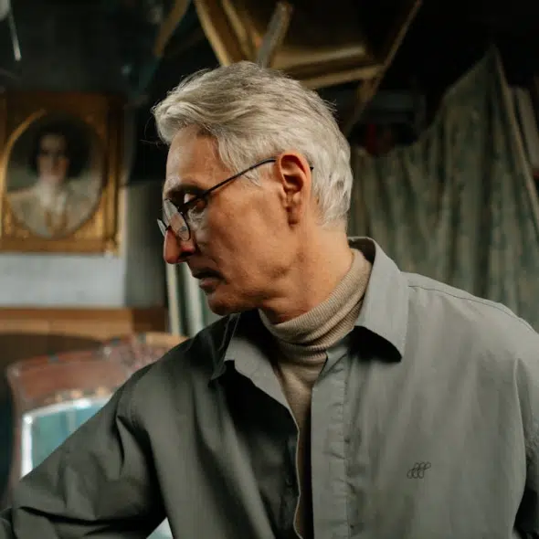 A man with eyeglasses