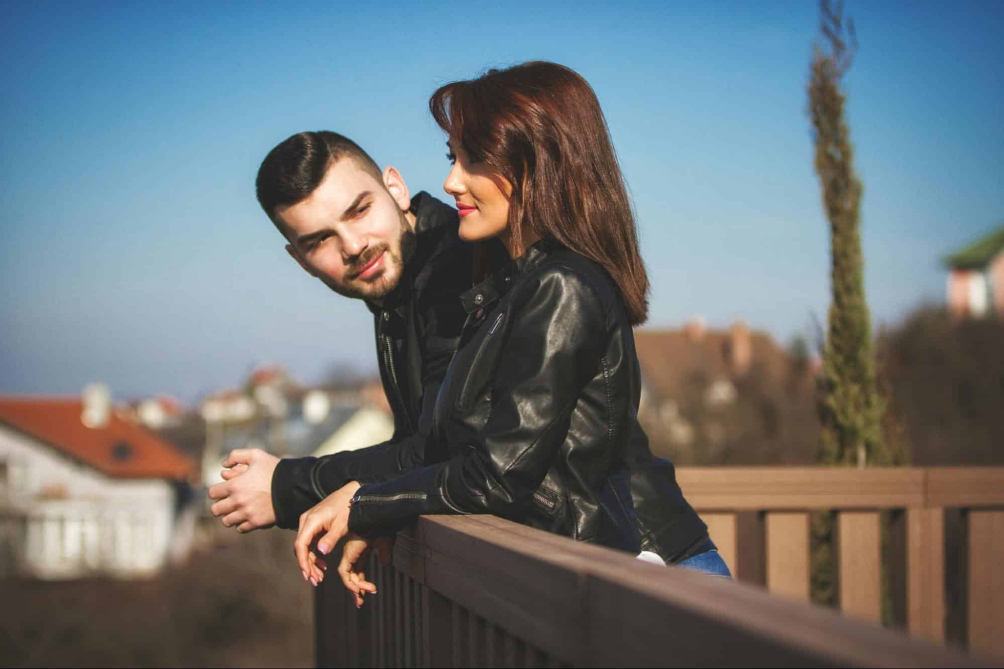 A man and woman at the balcony 