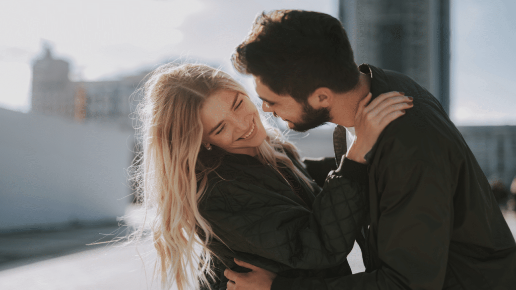 A couple about to kiss in public