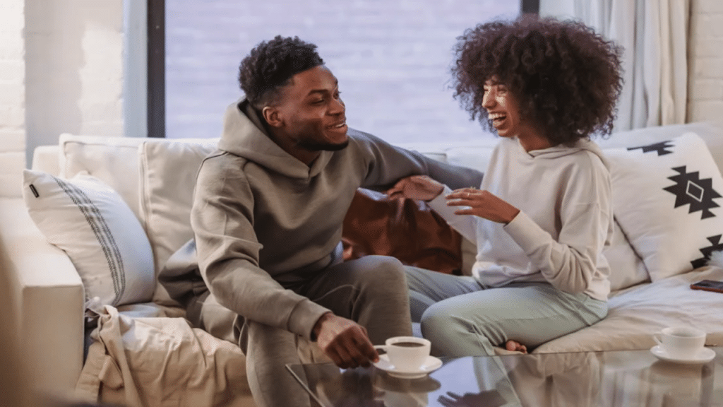 A couple laughing while talking