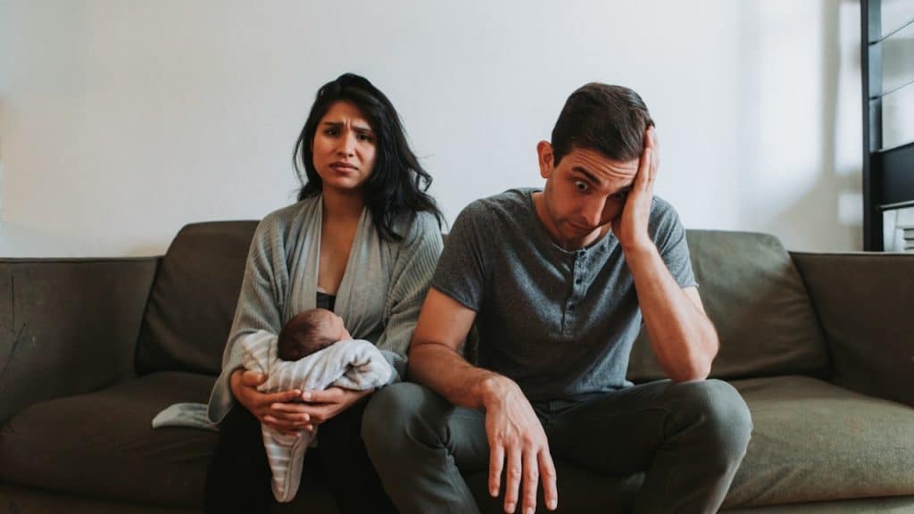 A distressed family after the arrival of a newborn baby.