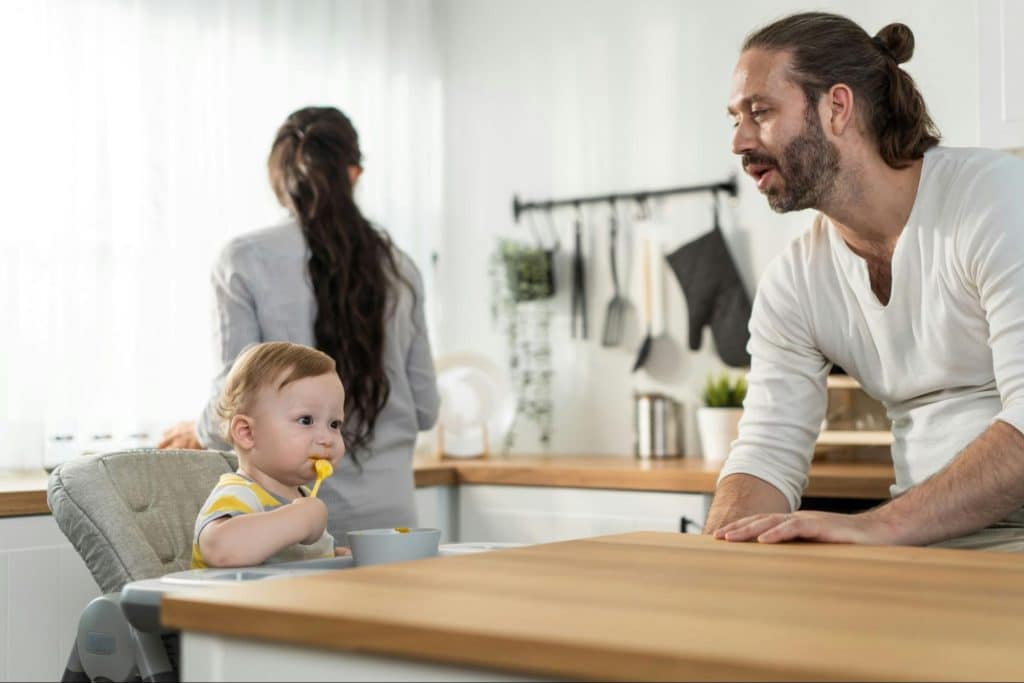 A man and woman with their child