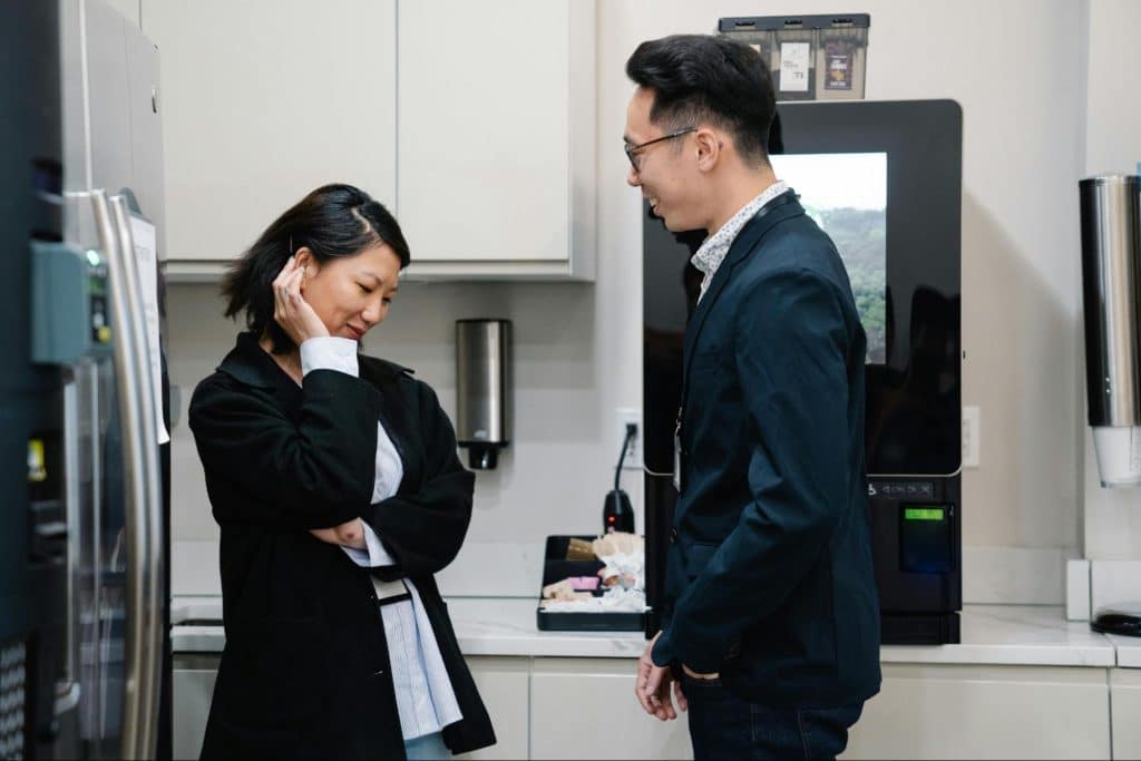 A man talking to woman