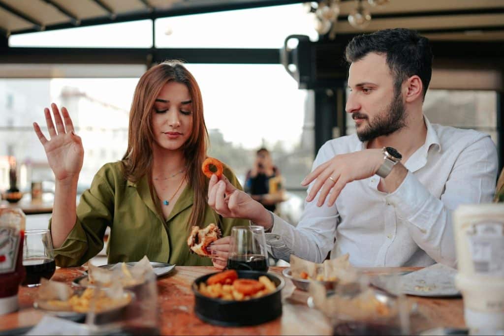 A man and woman talking