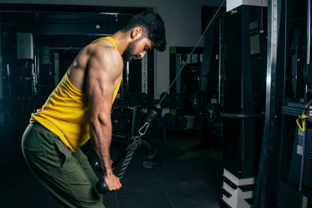 Man in Tank Top Practicing at Gym
