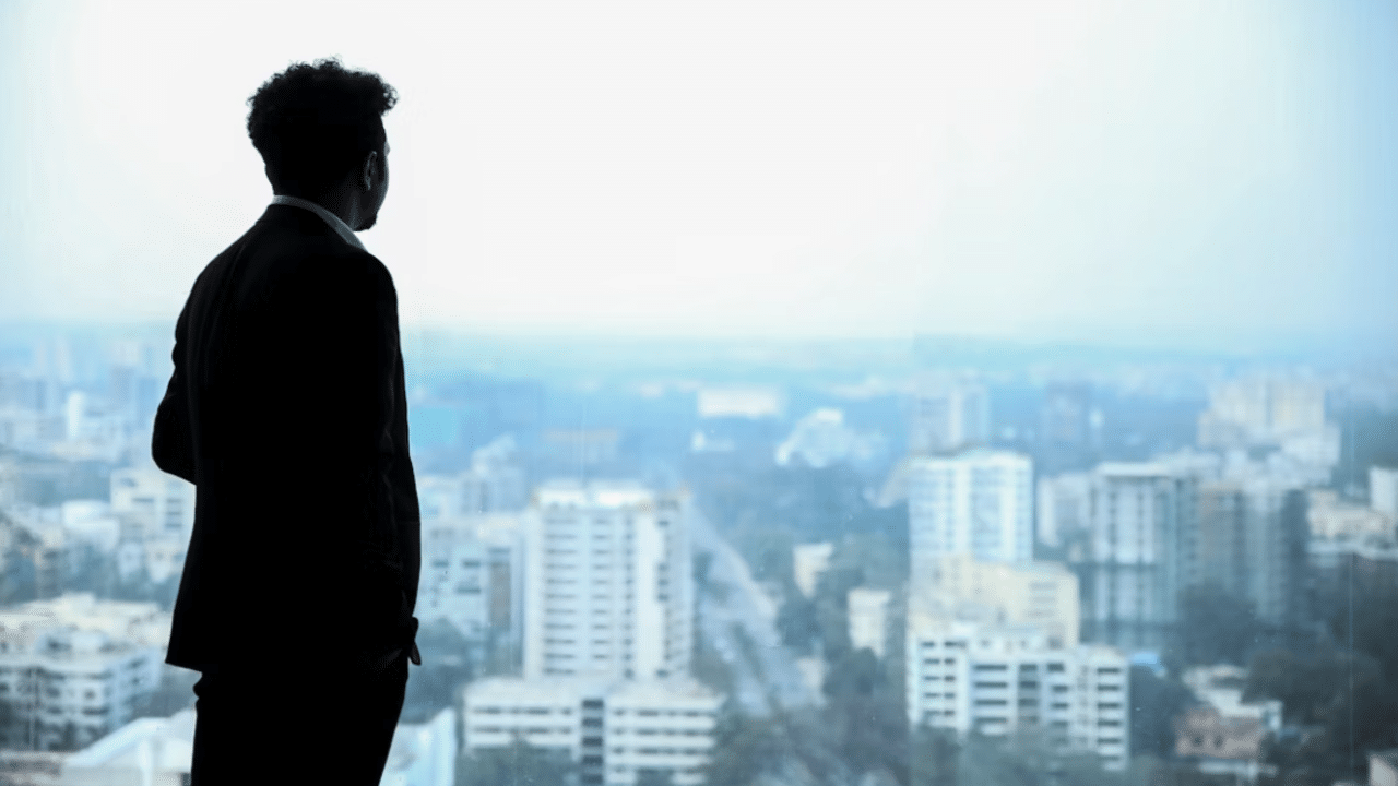 A man looking out the window