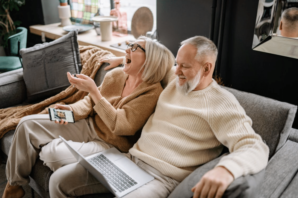 Elderly couple sitting on a sofa