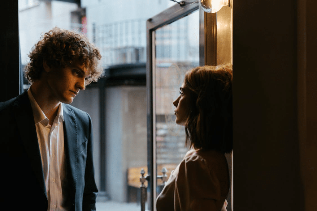 A young woman and a man having a conversation