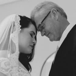 A man and a woman standing next to each other.