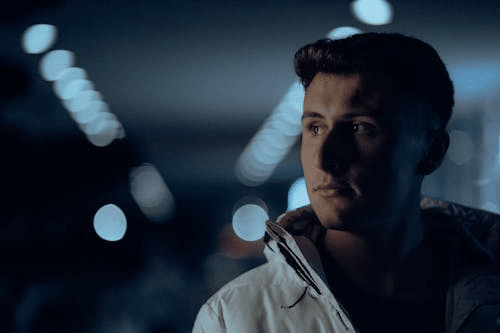 A man looking at the side