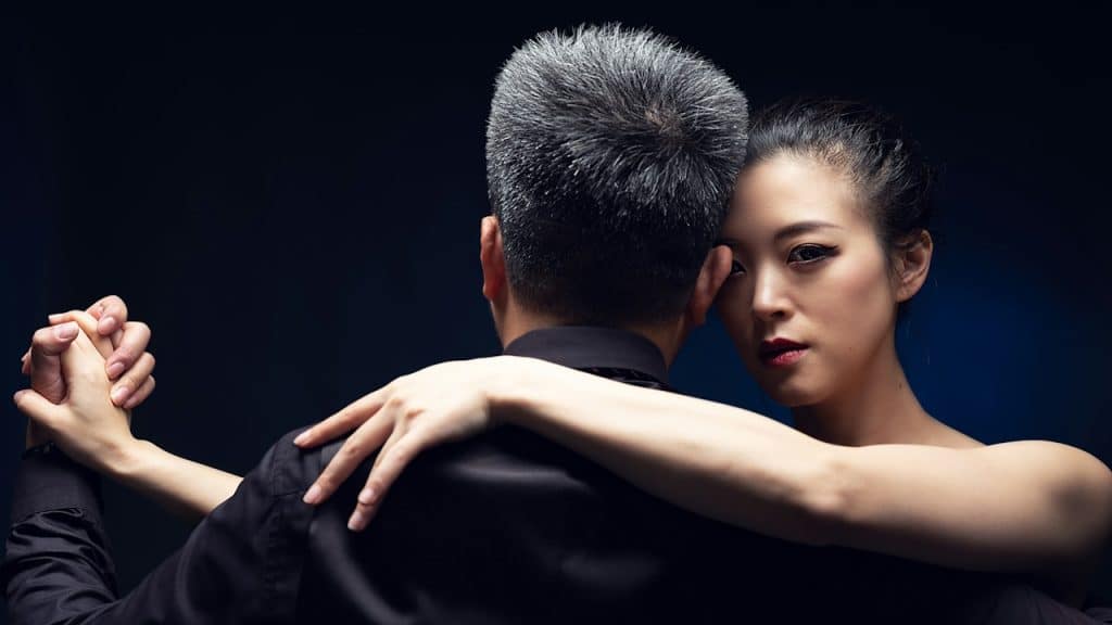 A man and a woman dancing together.