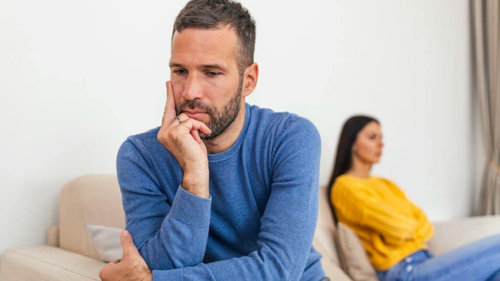 A couple having an argument at home.
