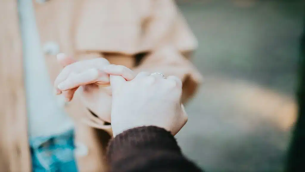 A couple doing the pinky promise
