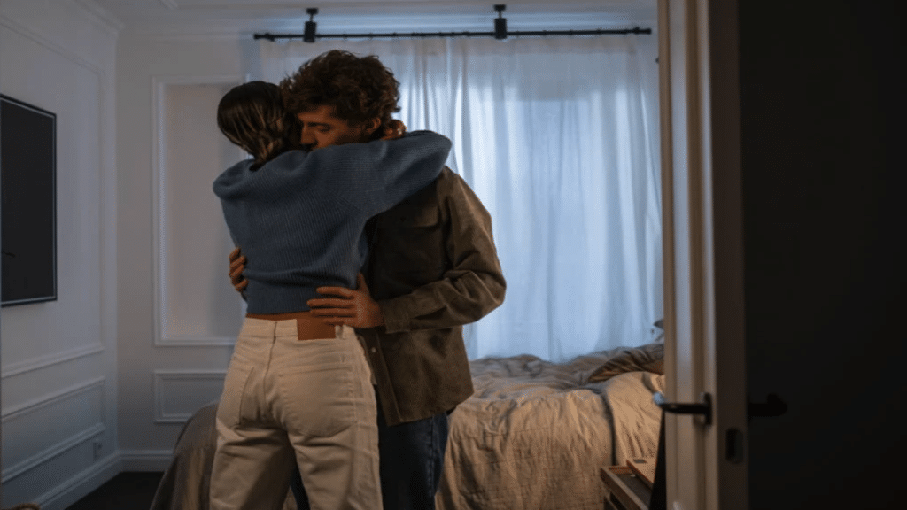 A couple hugging in the bedroom