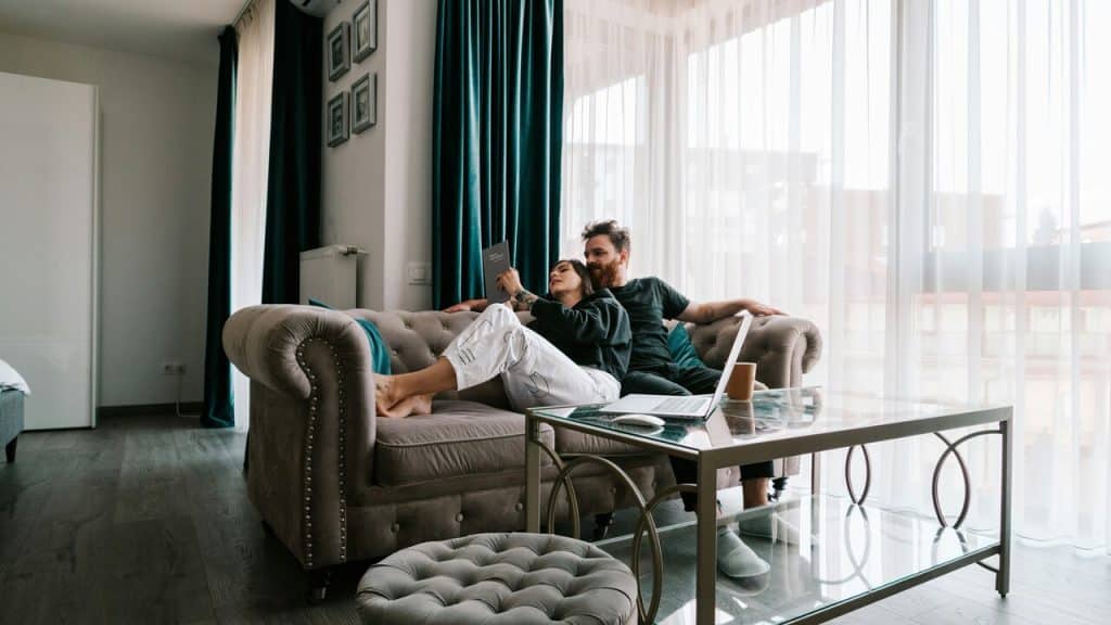 A couple reading together at home