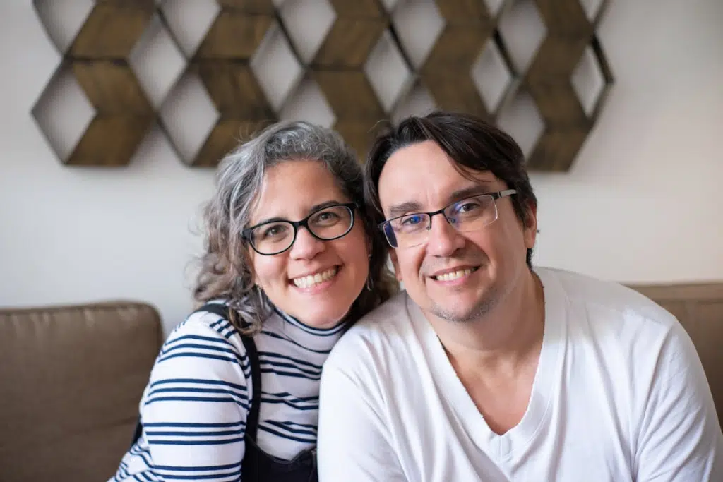 A man and woman smiling