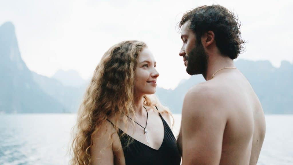 A couple having a romantic moment during travelling.