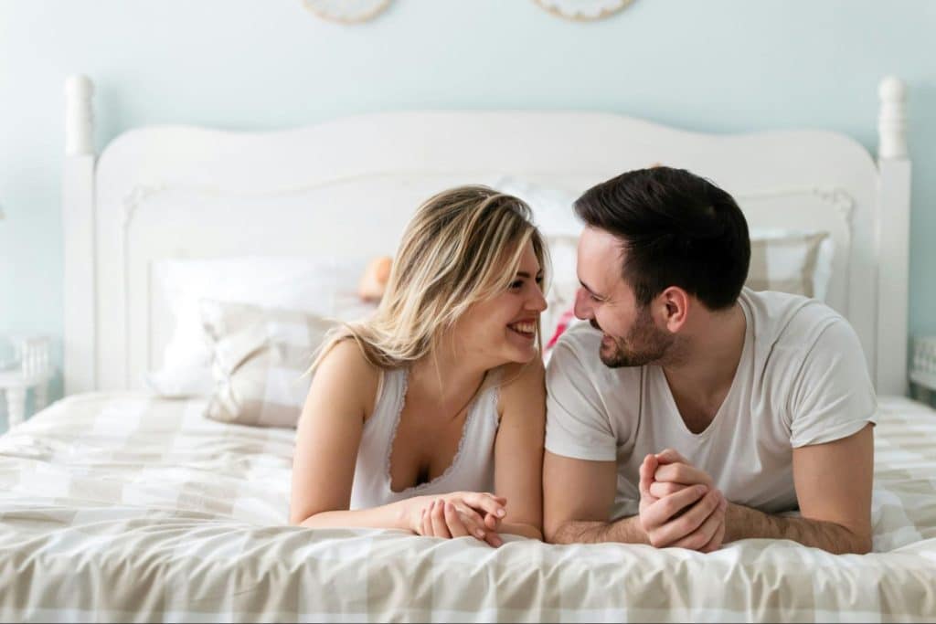A man and woman laughing together