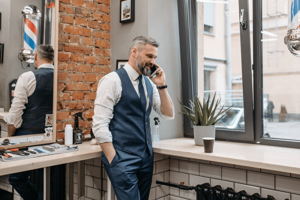 Man in Formal Attire having a Phonecall