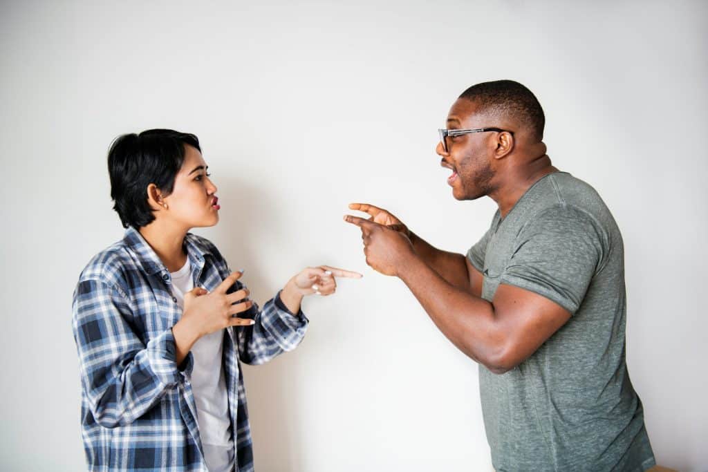 A couple fighting.