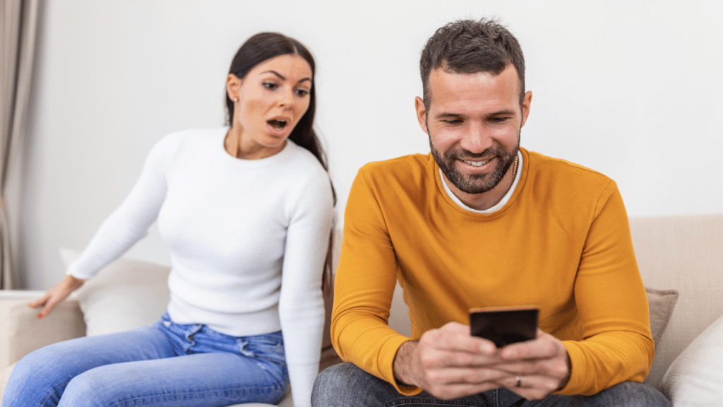 A woman shocked at who her friend is texting