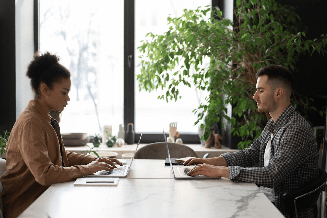 A man and woman working together