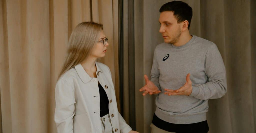 A man and woman having a conversation