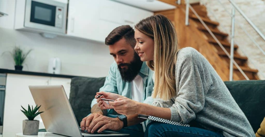 A man teaching a woman