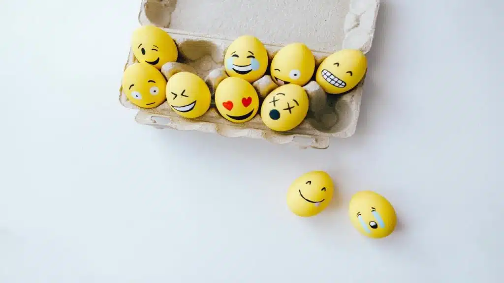 Eggs painted as emojis