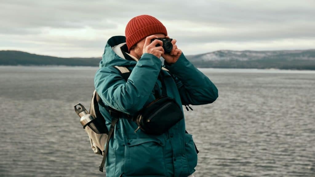 A man taking a picture on a hike