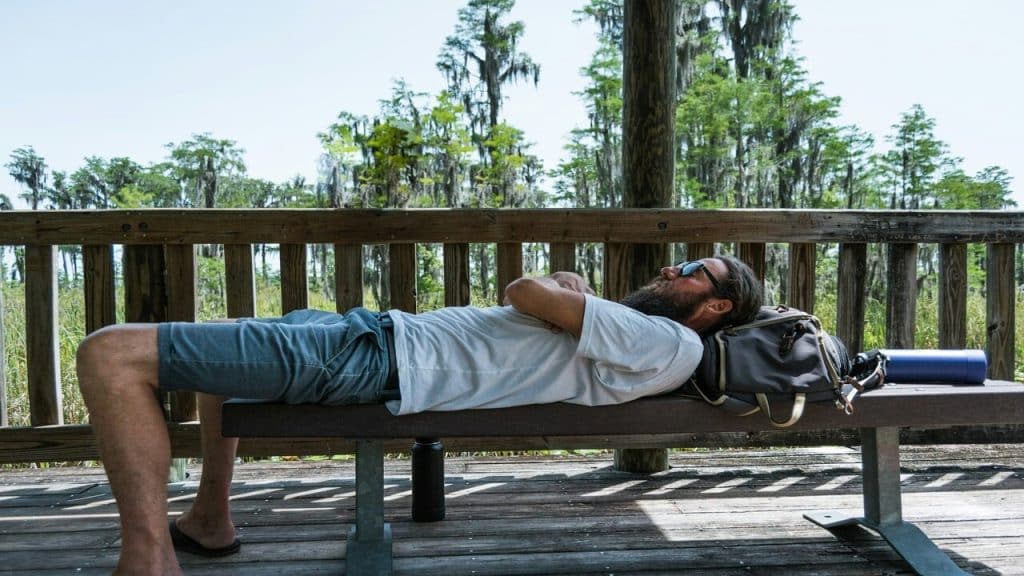 A man sleeping on a bench