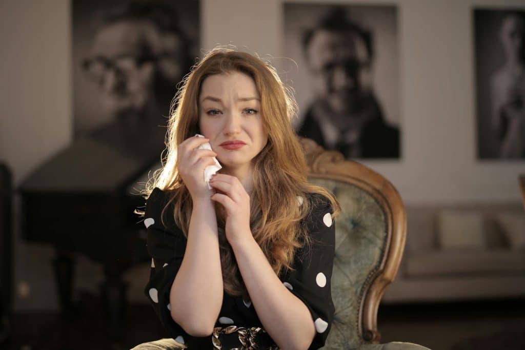 A woman crying.