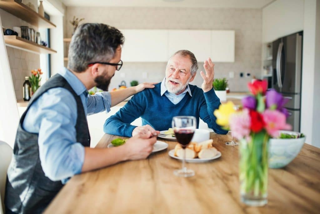 A father talking to his son.