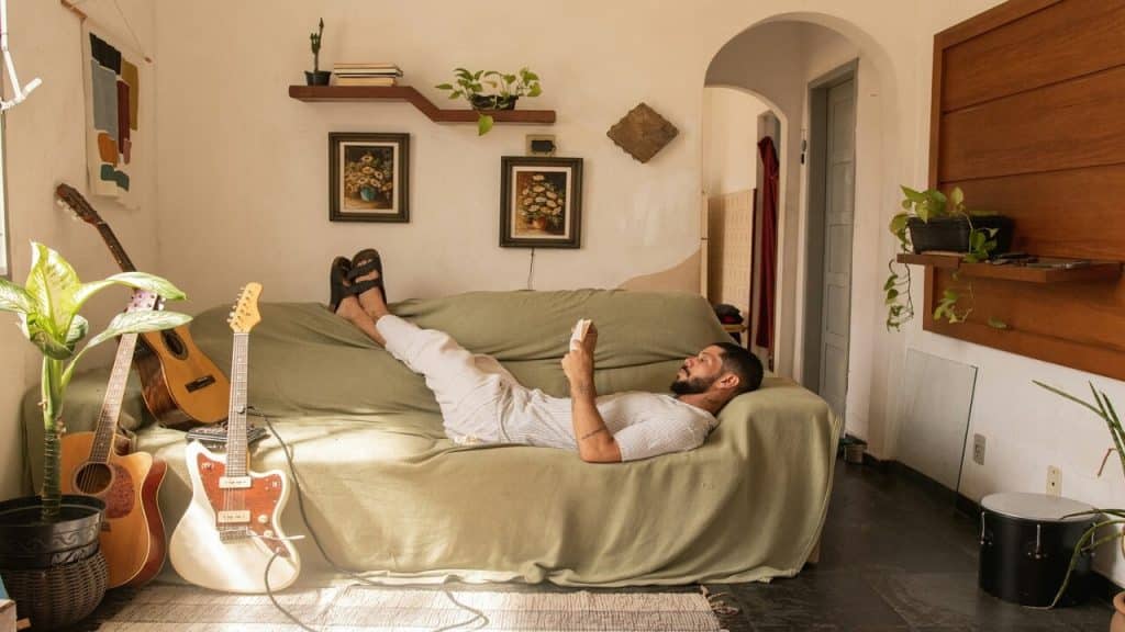 A man relaxing by himself at home
