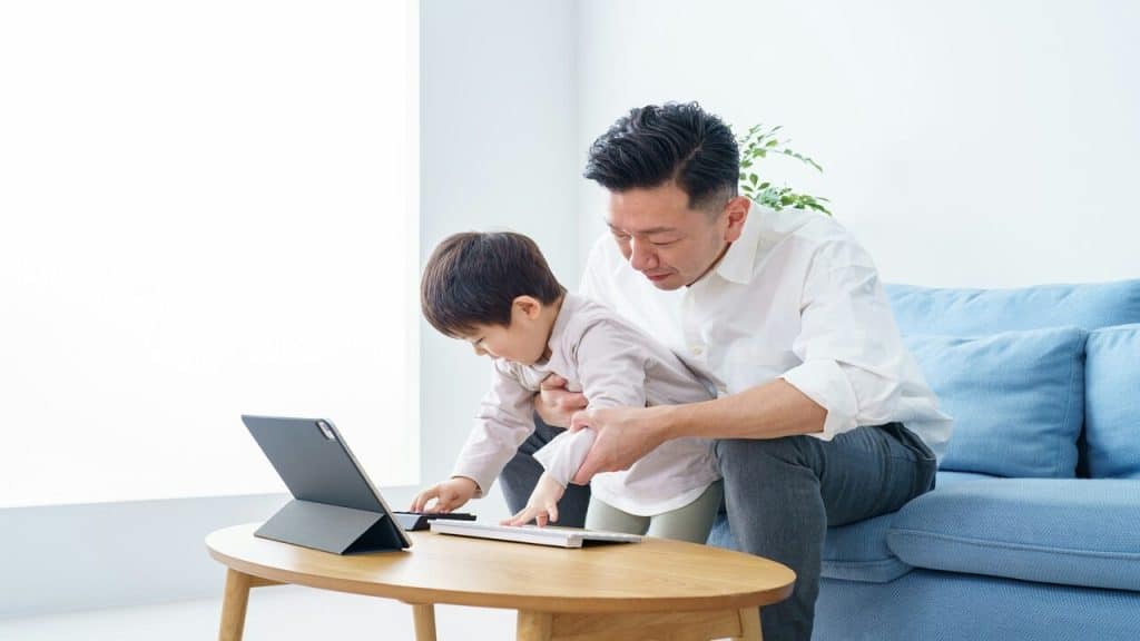 A dad spending time with his kid at home