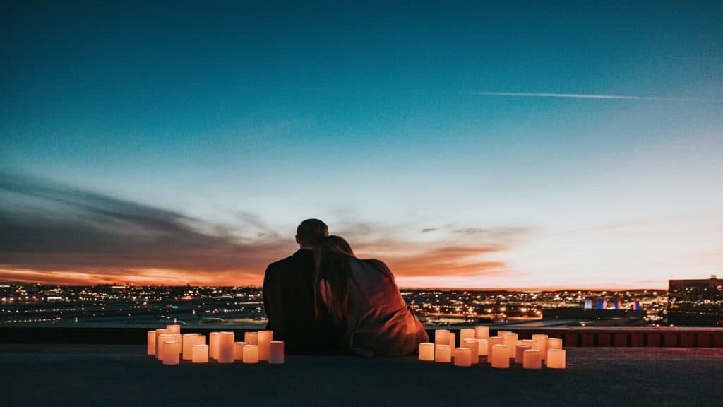 A couple having a romantic rooftop date