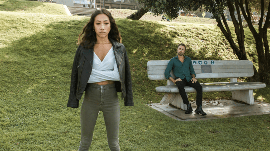 A couple looking upset in the park